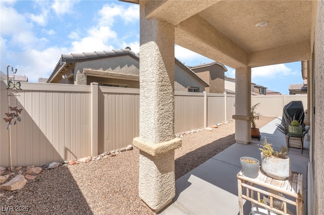 518 Descubir Ave, North Las Vegas, NV 89081 - fenced backyard with a patio area