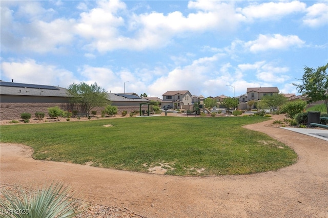 518 Descubir Ave, North Las Vegas, NV 89081 - view of home's community featuring a playground, a yard, and a residential view