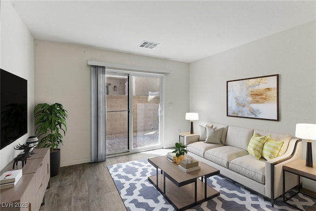 6850 Magenta Moon St, North Las Vegas, NV 89086 - living room featuring light wood-style flooring and baseboards