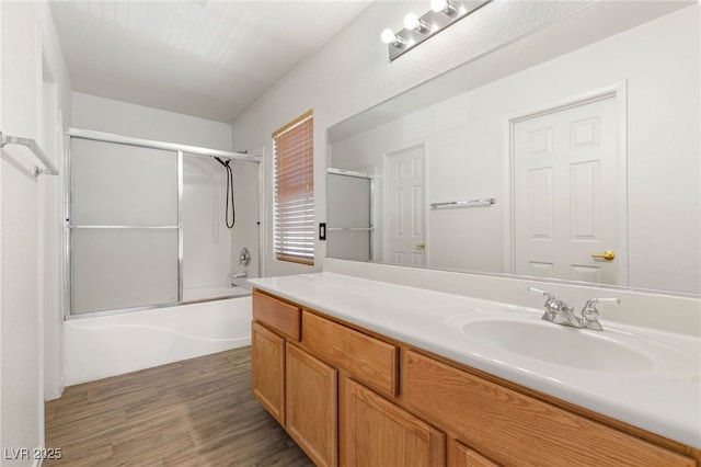 89 Day Trade St Unit 1, Henderson, NV 89074 - full bath with vanity, wood finished floors, and combined bath / shower with glass door