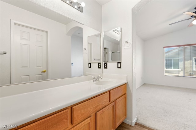 89 Day Trade St Unit 1, Henderson, NV 89074 - bathroom featuring ceiling fan, vaulted ceiling, and vanity