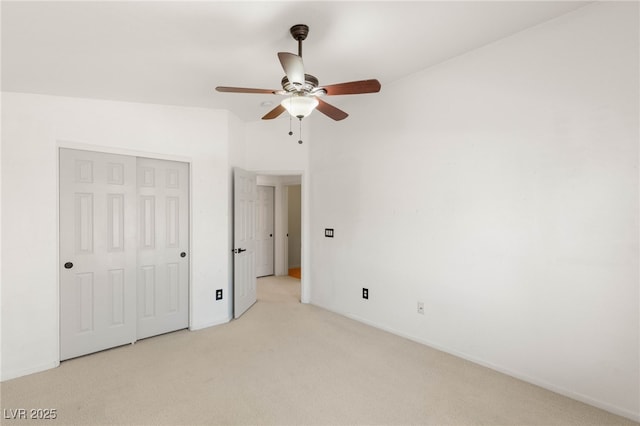 89 Day Trade St Unit 1, Henderson, NV 89074 - unfurnished bedroom featuring light carpet, a closet, and a ceiling fan