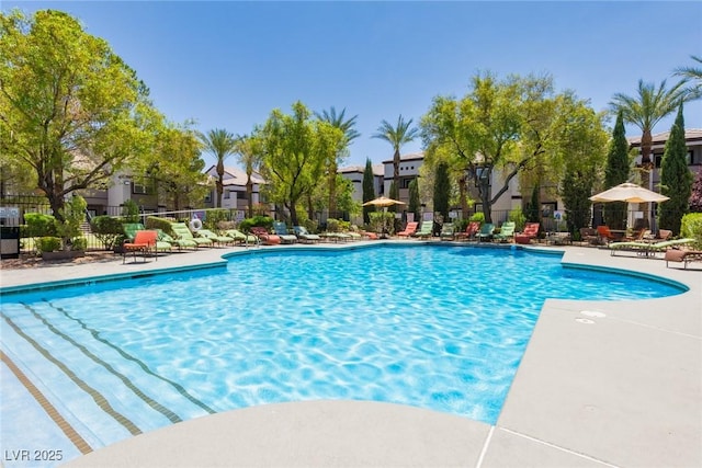 7255 W Sunset Rd Unit 2030, Las Vegas, NV 89113 - community pool with a patio area and a residential view