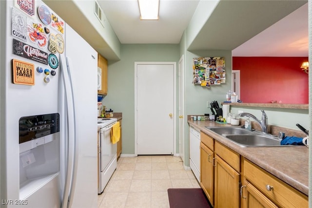 7255 W Sunset Rd Unit 2030, Las Vegas, NV 89113 - kitchen with white appliances and light countertops