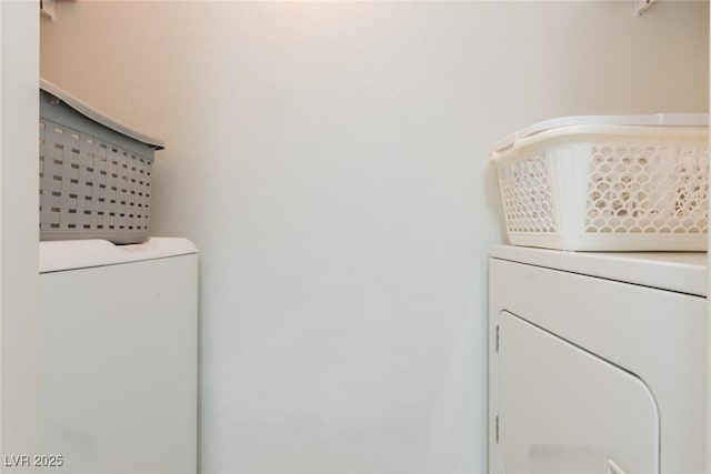 7255 W Sunset Rd Unit 2030, Las Vegas, NV 89113 - washroom featuring washing machine and clothes dryer