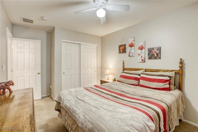 1208 Neva Ranch Ave, North Las Vegas, NV 89081 - bedroom with light colored carpet, a closet, and a ceiling fan