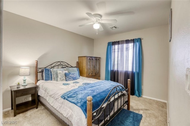 1208 Neva Ranch Ave, North Las Vegas, NV 89081 - bedroom with light colored carpet and a ceiling fan