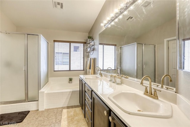 1208 Neva Ranch Ave, North Las Vegas, NV 89081 - full bath featuring a shower stall, double vanity, a garden tub, and tile patterned flooring