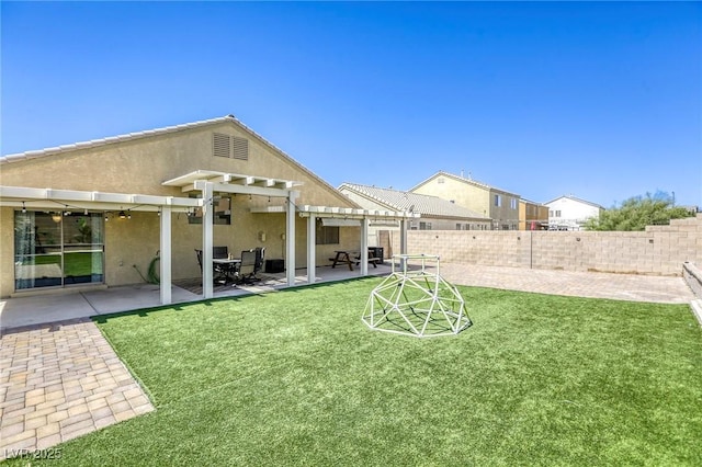 1208 Neva Ranch Ave, North Las Vegas, NV 89081 - fenced backyard featuring a pergola and a patio area