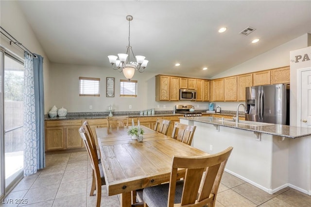 1208 Neva Ranch Ave, North Las Vegas, NV 89081 - dining space with lofted ceiling, a chandelier, light tile patterned floors, and recessed lighting