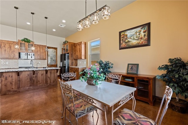479 Apogee Crst, Mesquite, NV 89027 - dining room featuring recessed lighting and concrete floors