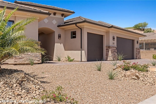 479 Apogee Crst, Mesquite, NV 89027 - view of front of home featuring a garage, concrete driveway, and stucco siding