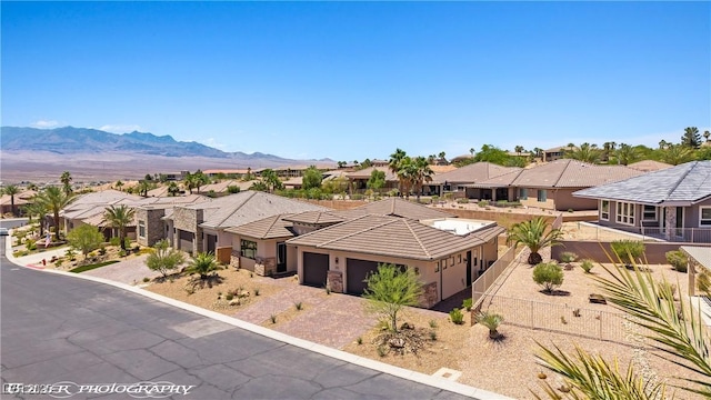 479 Apogee Crst, Mesquite, NV 89027 - prairie-style house with a residential view, an attached garage, driveway, stucco siding, and a tile roof