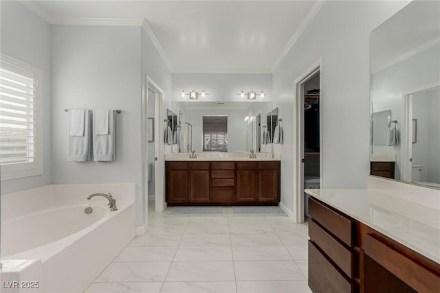 1304 Fantastic Ct, North Las Vegas, NV 89081 - full bathroom featuring marble look tile flooring, a garden tub, double vanity, ornamental molding, and a walk in closet