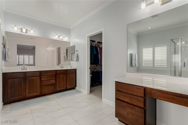 1304 Fantastic Ct, North Las Vegas, NV 89081 - full bathroom with a shower stall, double vanity, a walk in closet, ornamental molding, and marble finish flooring