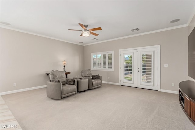 1304 Fantastic Ct, North Las Vegas, NV 89081 - living area with crown molding, a ceiling fan, light colored carpet, and french doors