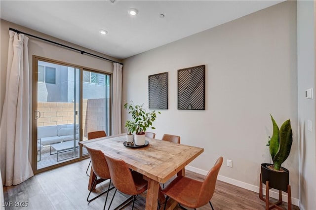 3358 Via Strada St, Henderson, NV 89044 - dining area featuring light wood-style floors and recessed lighting