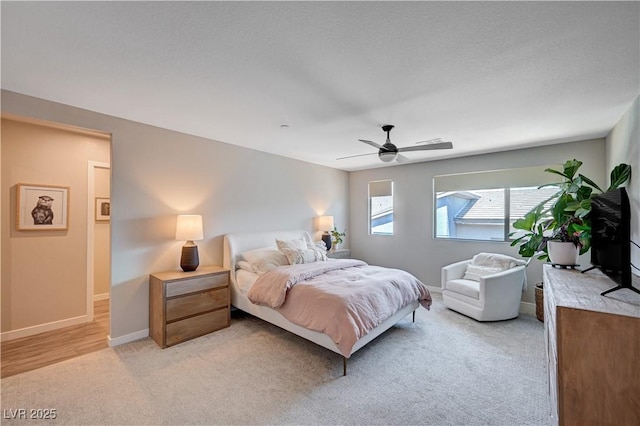 3358 Via Strada St, Henderson, NV 89044 - bedroom with light carpet and a ceiling fan