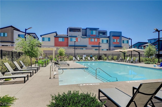 3358 Via Strada St, Henderson, NV 89044 - community pool featuring a residential view and a patio