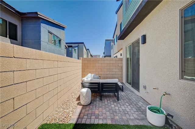 3358 Via Strada St, Henderson, NV 89044 - view of patio with an outdoor hangout area