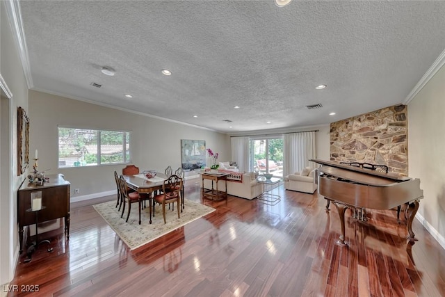 2101 Plaza Del Fuentes, Las Vegas, NV 89102 - dining room featuring ornamental molding, healthy amount of natural light, a textured ceiling, wood finished floors, and recessed lighting