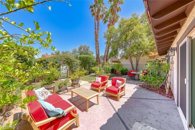 2101 Plaza Del Fuentes, Las Vegas, NV 89102 - fenced backyard with a patio and an outdoor hangout area