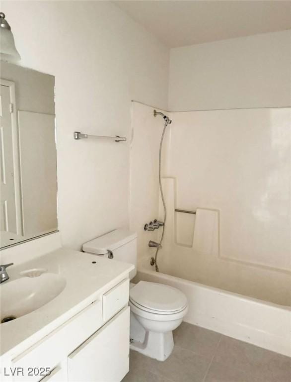 4338 Caliente St Unit 12, Las Vegas, NV 89119 - full bathroom featuring tile patterned floors, vanity, and bathtub / shower combination