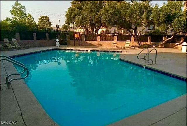 4338 Caliente St Unit 12, Las Vegas, NV 89119 - community pool featuring a patio area