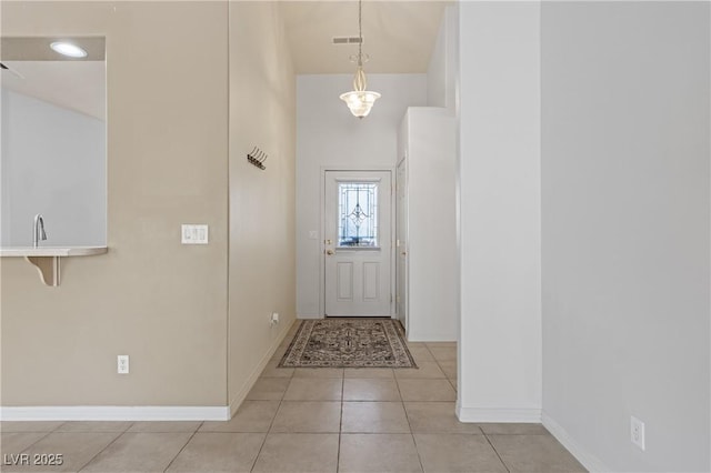 871 Falcon Glenn Dr, Mesquite, NV 89027 - entrance foyer featuring light tile patterned floors and a high ceiling