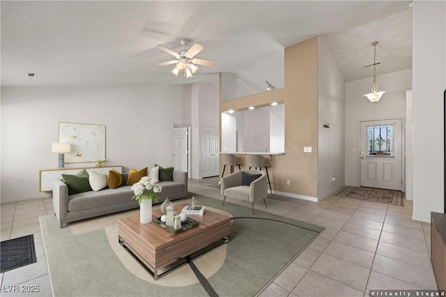 871 Falcon Glenn Dr, Mesquite, NV 89027 - living area with tile patterned flooring, high vaulted ceiling, and ceiling fan