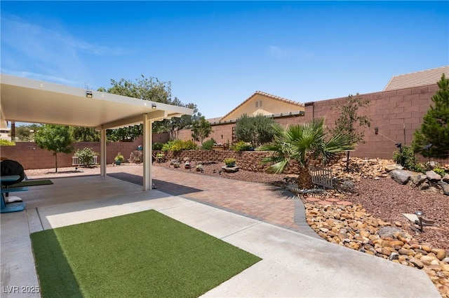 871 Falcon Glenn Dr, Mesquite, NV 89027 - fenced backyard featuring a patio area