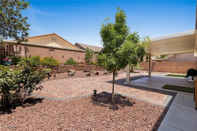 871 Falcon Glenn Dr, Mesquite, NV 89027 - fenced backyard with a patio