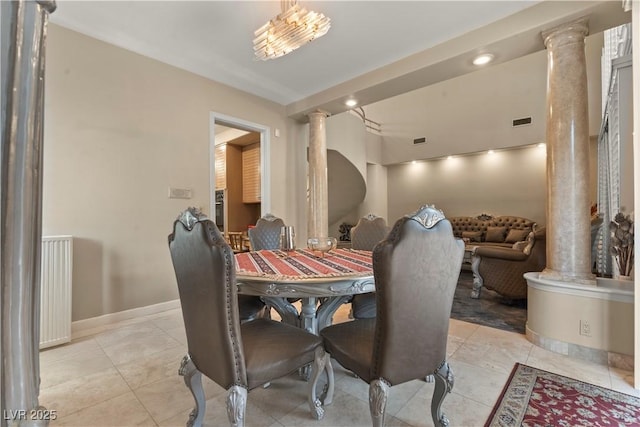 8215 Crow Valley Ln, Las Vegas, NV 89113 - dining space with decorative columns and light tile patterned floors
