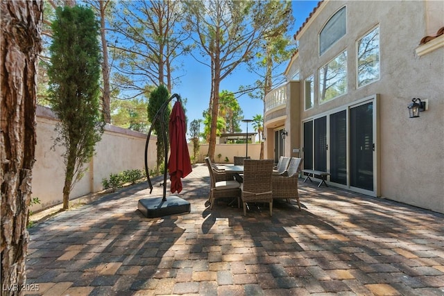 8215 Crow Valley Ln, Las Vegas, NV 89113 - fenced backyard with outdoor dining space and a patio area