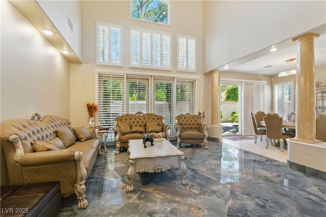 8215 Crow Valley Ln, Las Vegas, NV 89113 - living room featuring ornate columns, marble tiled flooring, a towering ceiling, and recessed lighting