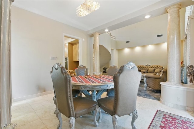 8215 Crow Valley Ln, Las Vegas, NV 89113 - dining area featuring ornate columns and light tile patterned floors