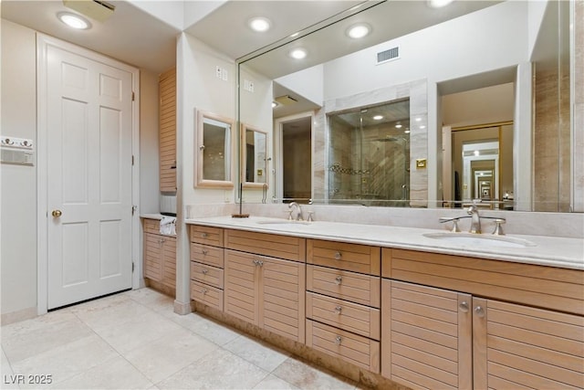 8215 Crow Valley Ln, Las Vegas, NV 89113 - full bath with double vanity, a stall shower, tile patterned floors, and recessed lighting