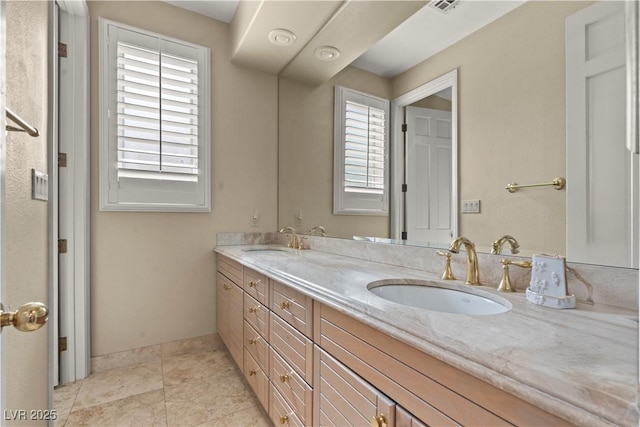 8215 Crow Valley Ln, Las Vegas, NV 89113 - full bath with double vanity and baseboards