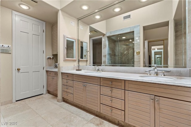 8215 Crow Valley Ln, Las Vegas, NV 89113 - bathroom with double vanity, a shower stall, tile patterned floors, and recessed lighting