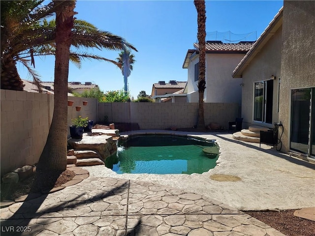 8712 Texas Bronco Ave, Las Vegas, NV 89129 - view of pool with a fenced backyard, entry steps, and a patio