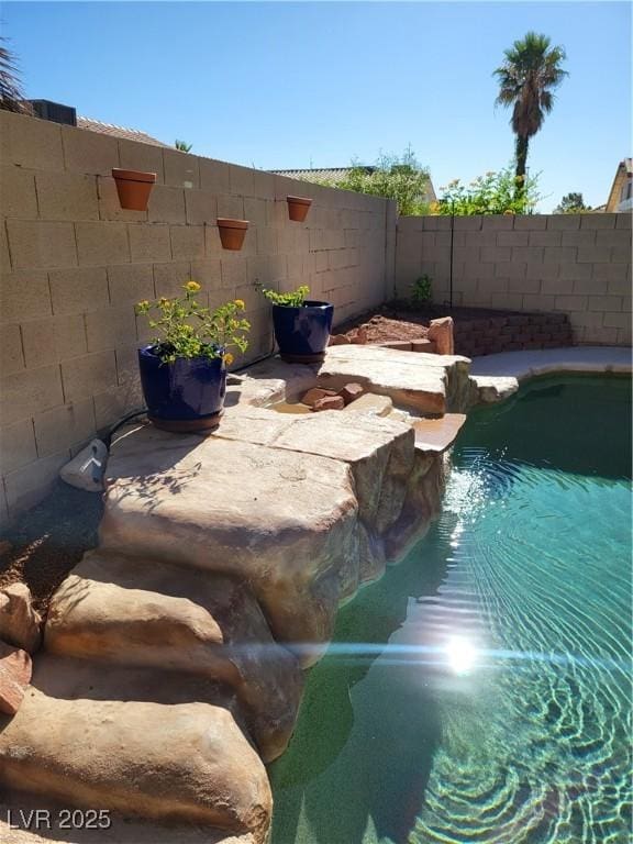 8712 Texas Bronco Ave, Las Vegas, NV 89129 - view of swimming pool with a fenced backyard and a patio