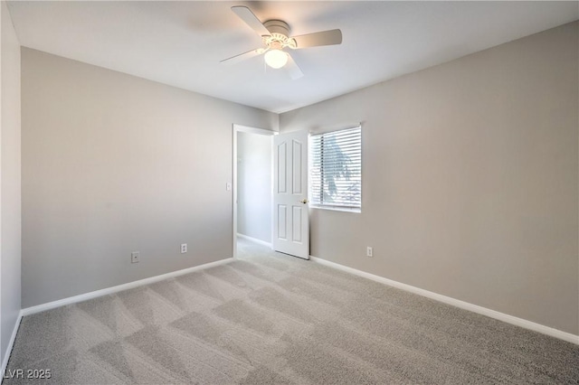 8712 Texas Bronco Ave, Las Vegas, NV 89129 - spare room featuring light carpet and ceiling fan