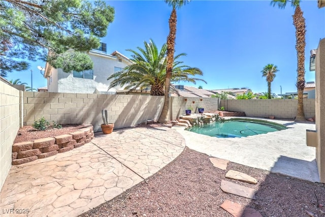 8712 Texas Bronco Ave, Las Vegas, NV 89129 - view of swimming pool featuring a patio and a fenced backyard