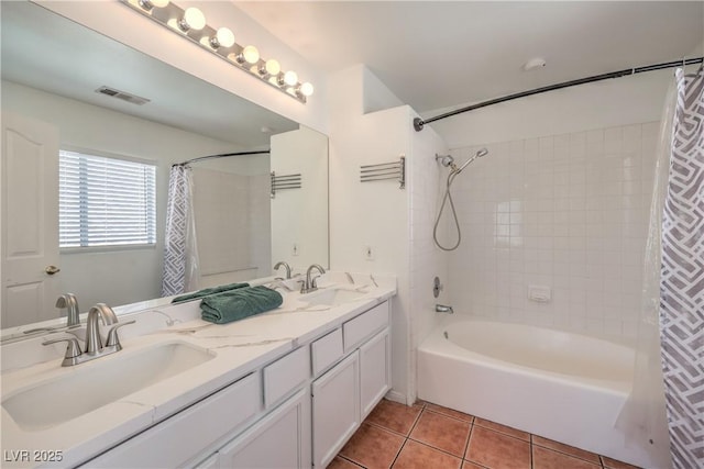8712 Texas Bronco Ave, Las Vegas, NV 89129 - full bathroom featuring shower / bath combo, tile patterned flooring, and double vanity