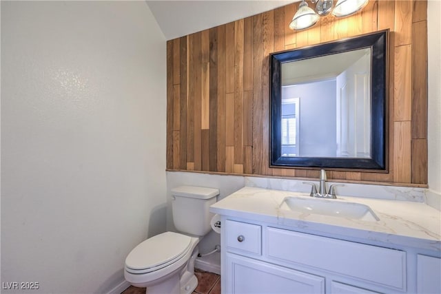 8712 Texas Bronco Ave, Las Vegas, NV 89129 - half bath featuring vanity and wood walls