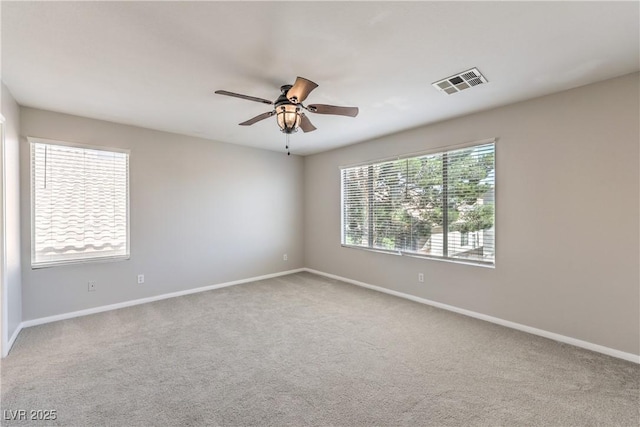 8712 Texas Bronco Ave, Las Vegas, NV 89129 - carpeted spare room with a ceiling fan and baseboards