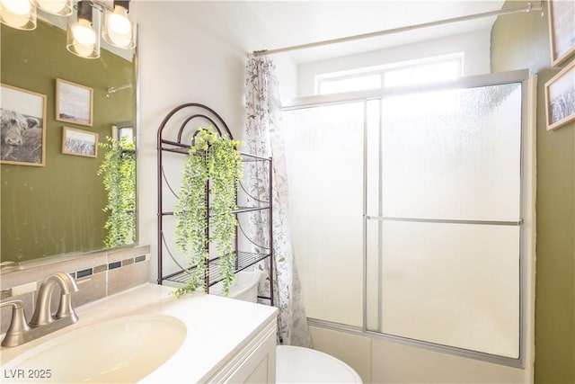 5673 Coaldale Pl, Las Vegas, NV 89110 - bathroom featuring decorative backsplash and vanity