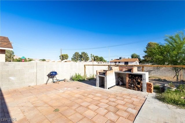 5673 Coaldale Pl, Las Vegas, NV 89110 - fenced backyard with a patio and a grill