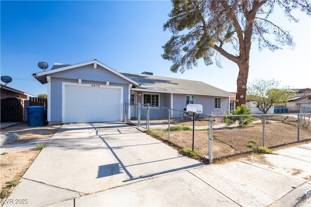 5673 Coaldale Pl, Las Vegas, NV 89110 - ranch-style home with a garage, driveway, and stucco siding