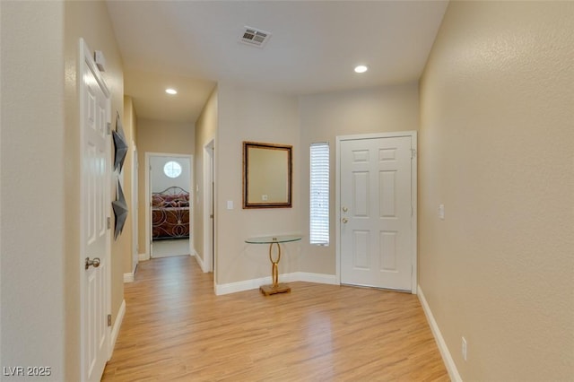 10243 Songsparrow Ct, Las Vegas, NV 89135 - entryway with light wood-type flooring and recessed lighting